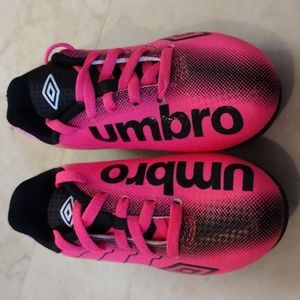 Umbro athletic cleats.